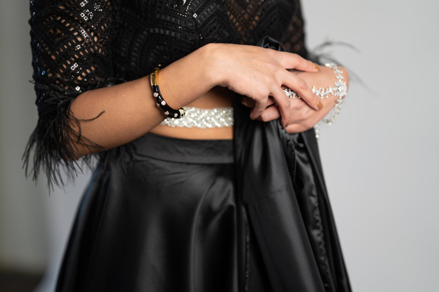 Kaira: Black Cutwork Blouse & Satin Lehenga Set